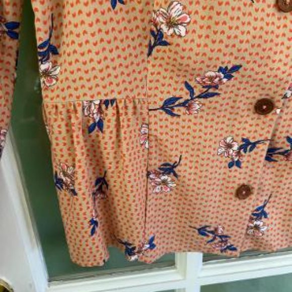 Long sleeved, V-neck, peplum style blouse - Picture 4 of 5